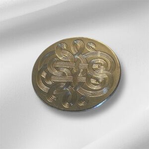 A vintage silver tone scarf clip 1970s